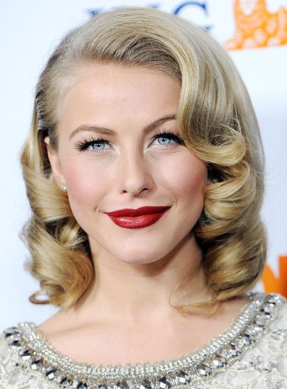 Sleek flat crown finished with defined sculpted curls at the ends